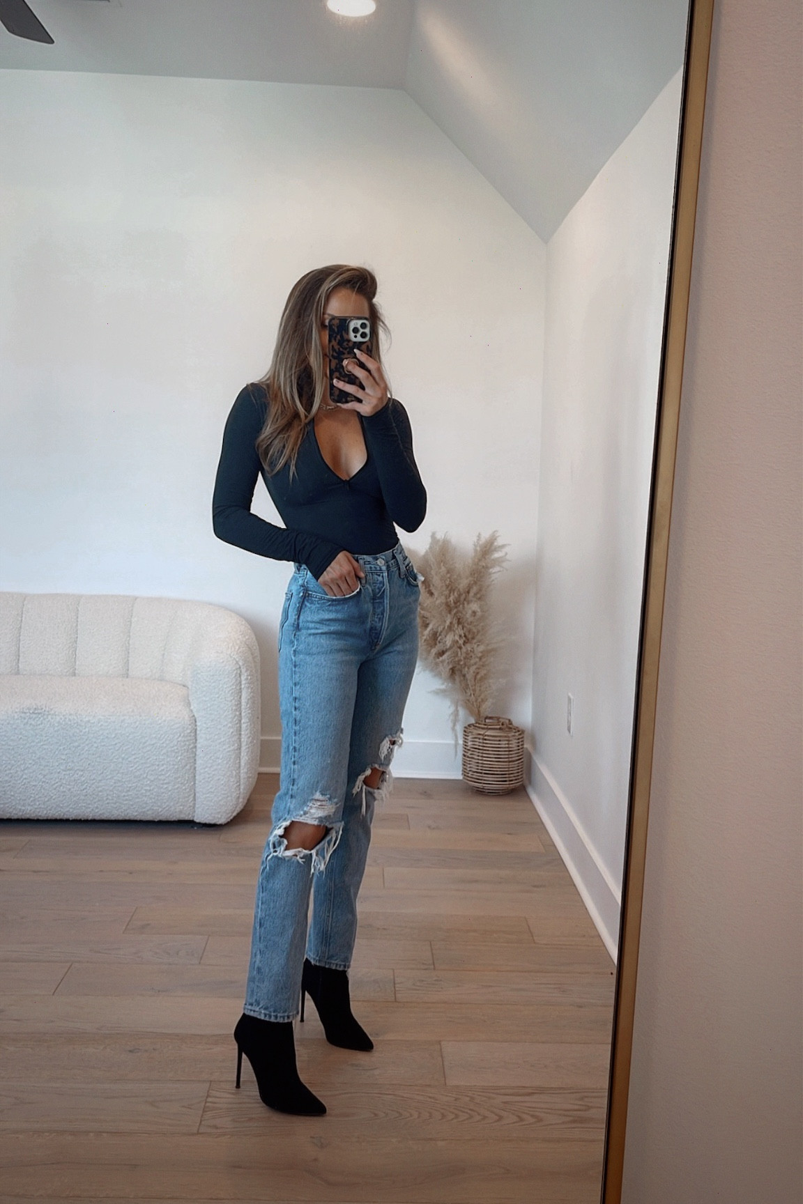 Skims bodysuit in xs
Agolde denim in 23
Black booties I love 

#LTKGiftGuide #LTKover40 #LTKHoliday