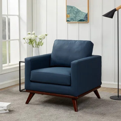 Khadeshia Modern Accent Arm Chair Upholstered in Faux Leather With Birch Wood Base | Wayfair North America