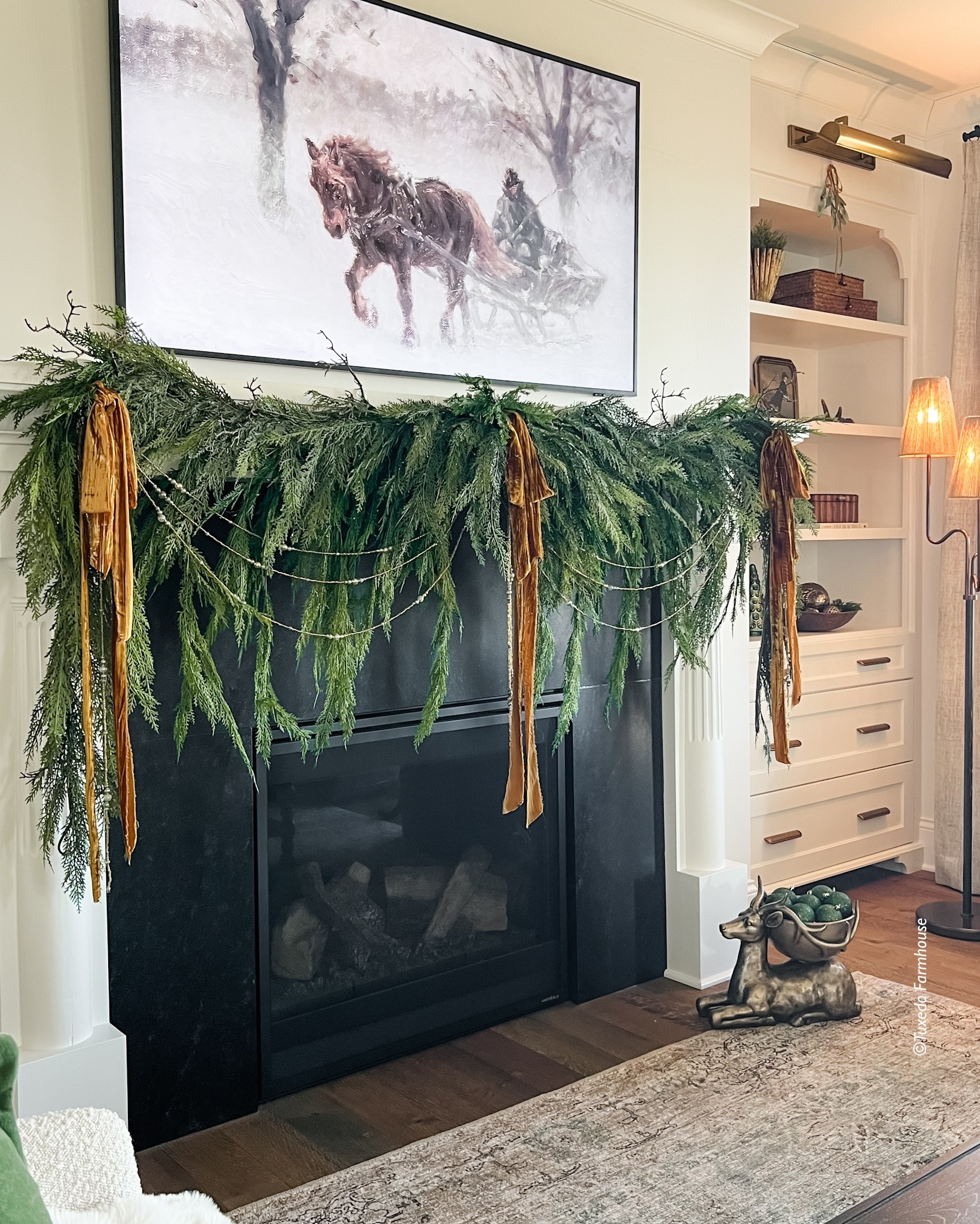 — My mantel garland is back in stock and 20% off! It’s so easy to style — see my reel tutorial. I’m using 2 draping cedar, 2 stick cedar and a swag in the middle on my 7 foot mantle. 

 #LTKSeasonal #LTKHome #LTKSaleAlert