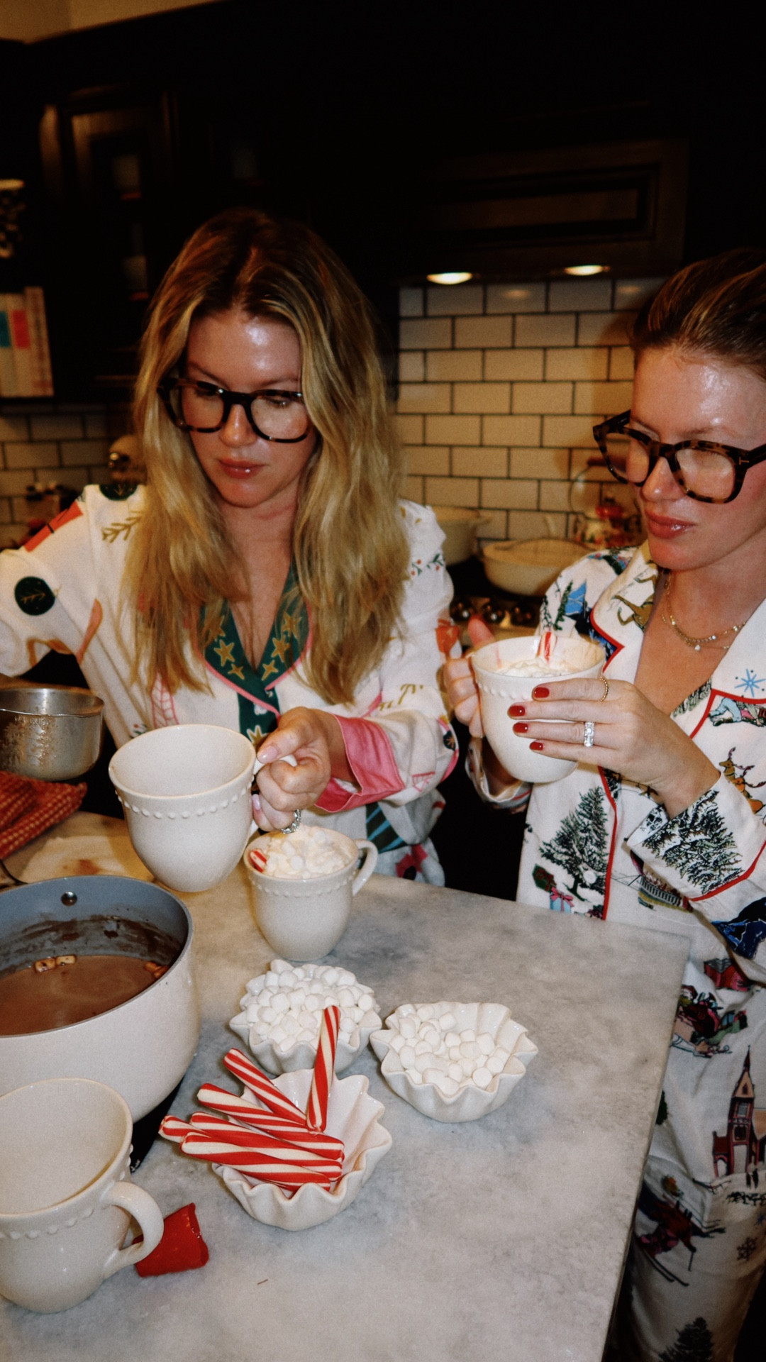 All Together Now in @katiekime | It is our most favorite time of the year as the distance between Dallas and Houston get shorter as we spend the holidays together! Our homes are cramped, everyone is talking *very* loud, the kitchen is messy...but it's all evidence of a holiday well spent! We are loving our matching @katiekime pajamas this year, and it's the perfect time to shop because the more you shop the more you save! Shop our favorites at the link! X, H & K //  #katiekimepartner