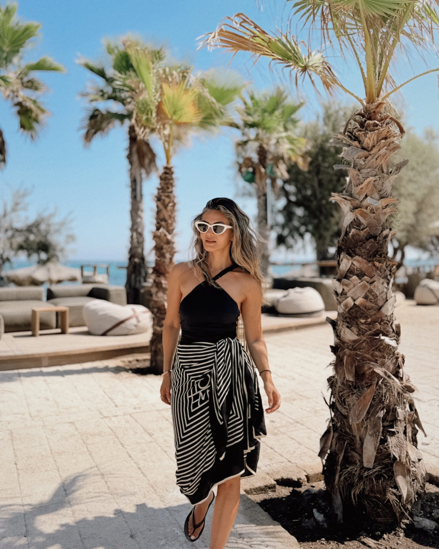 My holiday outfit formula: a swimsuit and sarong!

#LTKsummer #LTKeurope #LTKtravel