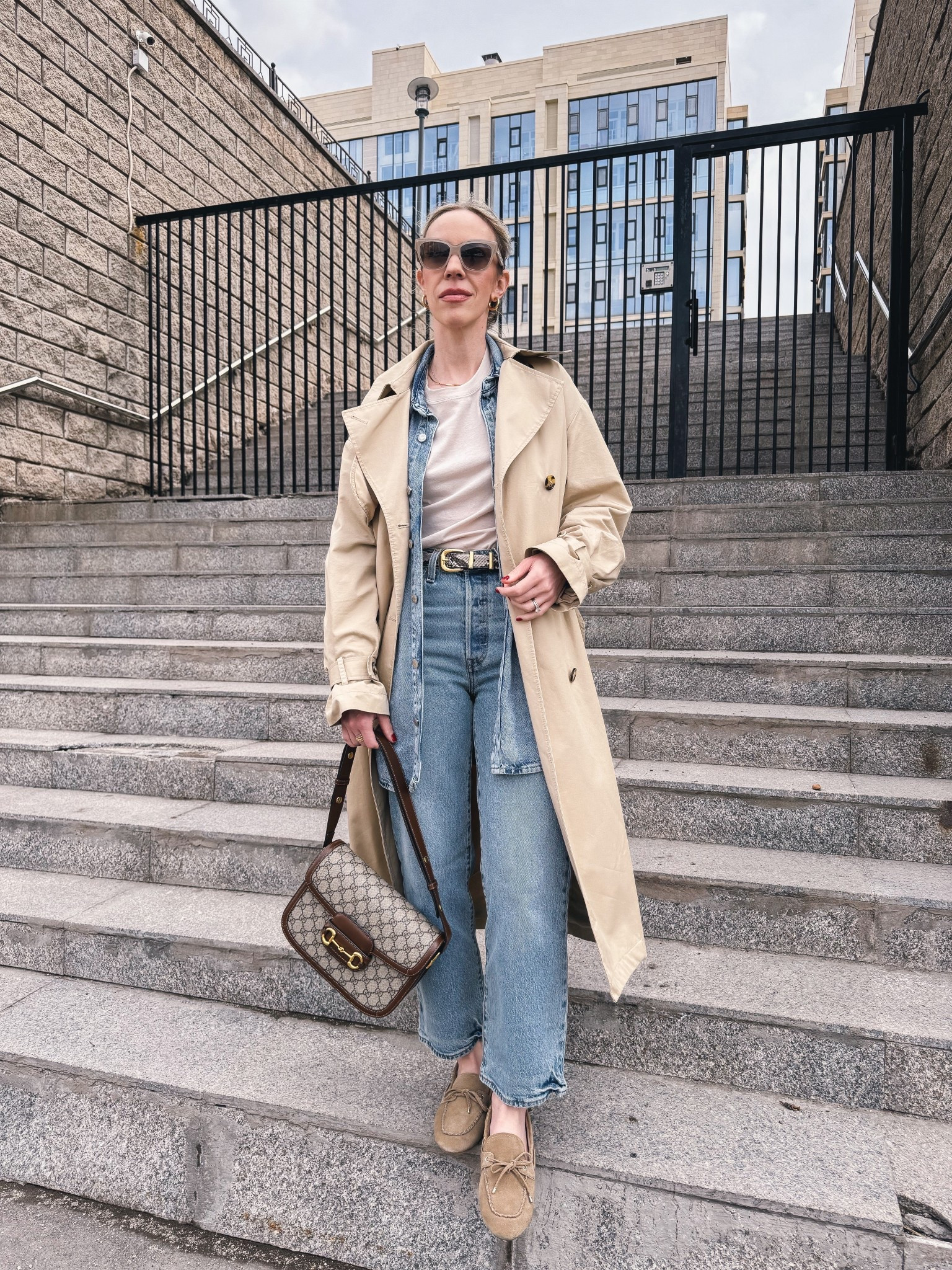 Spring outfit, trench coat, all denim outfit, snakeskin belt, @Levi's ribcage ankle jeans, suede loafers, Gucci bag 

#LTKSaleAlert #LTKSeasonal #LTKOver40