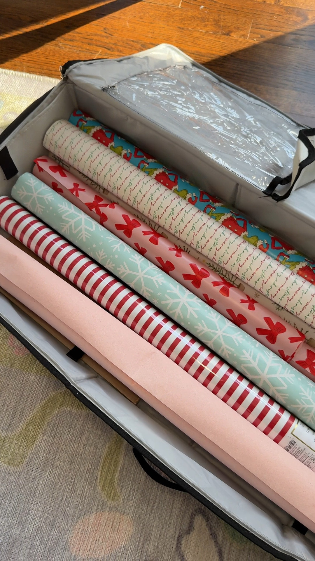 The most efficient way to store Christmas wrapping paper! This container easily stores wrapping paper, gift bags, ribbons, tape, scissors, gift tags, and more! I used to keep mine in a huge Rubbermaid bin and smaller items were always getting stuck at the bottom and lost. This is such a better way to see everything all at once and keep it organized.  Plus, I love that. It keeps your Christmas wrapping paper separate from wrapping paper that you would need throughout the year for birthdays etc  

#LTKHome #LTKFindsUnder50 #LTKSeasonal