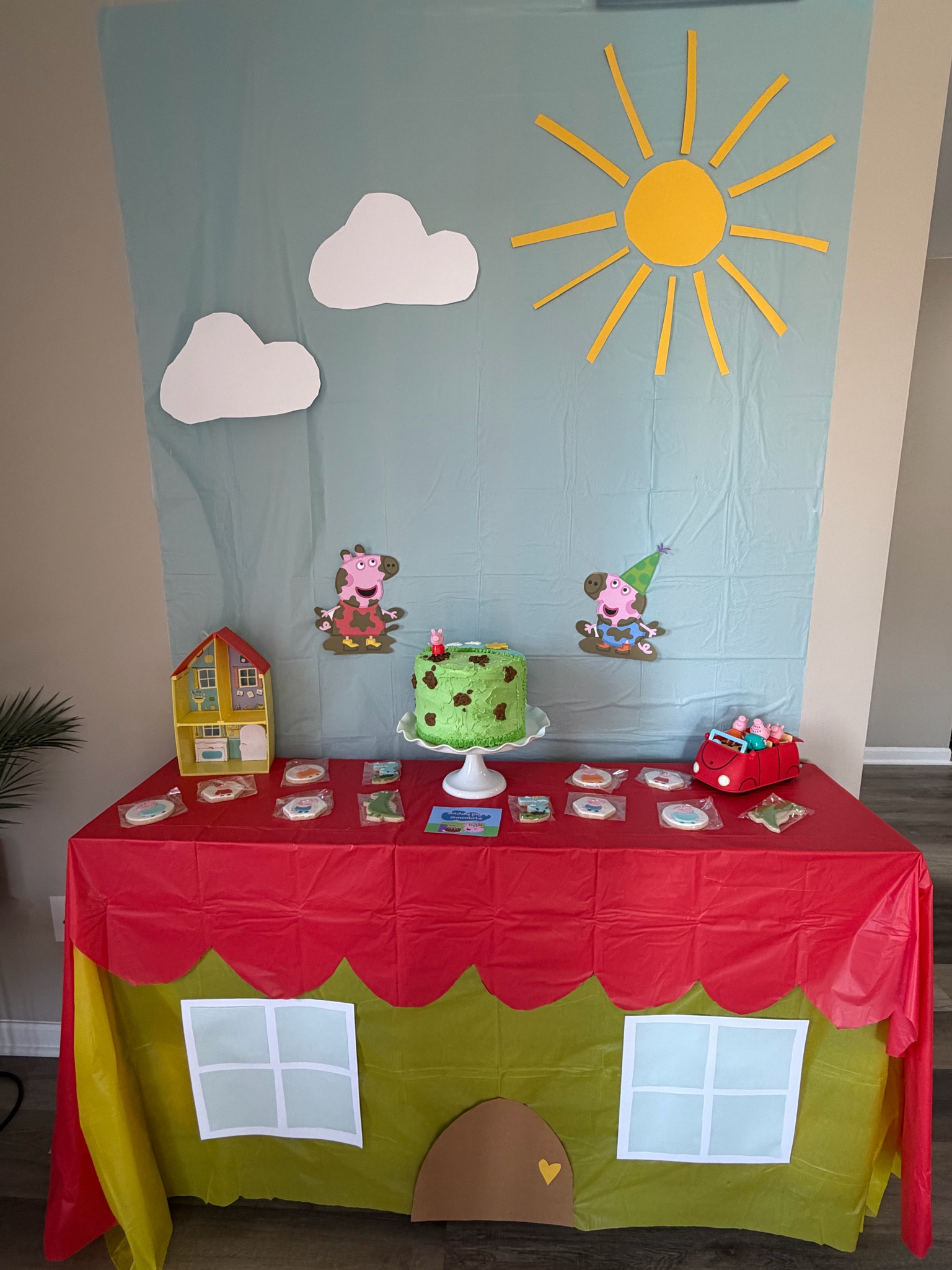 My son’s Peppa pig birthday party was an easy, and fun setup! I made the food cards on canva and printed them on cardstock, and used cardstock paper for the windows, door, sun and clouds on the backdrop. Not pictured we also played pin the tail on Peppa, I just printed off a Peppa, attached it to a poster board, and made little paper pink tails. 

#LTKmomlife #LTKKids
