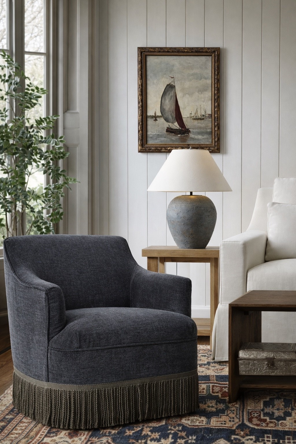 Arhaus and Pottery Barn Living Room furniture and decor.

Arhaus swivel chair, slip covered sofa, wood coffee table, patterned rug. 

#LTKHome