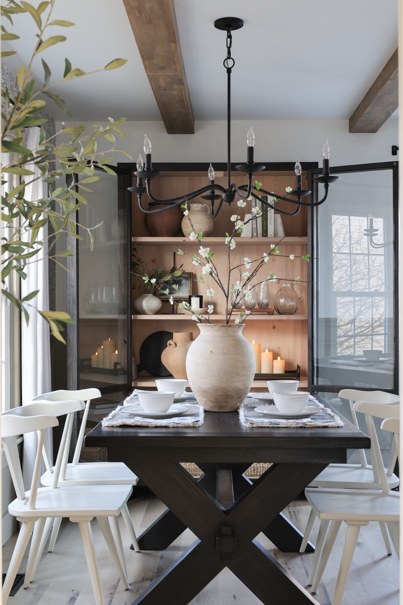 Pottery barn furniture, dining room furniture, display cabinet, black cabinet, white dining chairs, black extendable dining table 

#LTKHome #LTKFindsUnder100