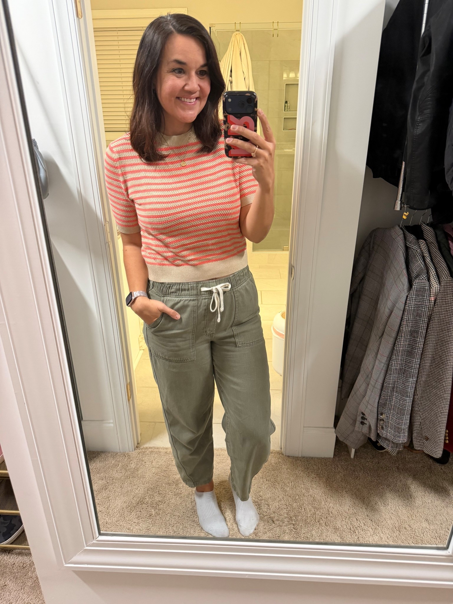 Love the neon coral color of this striped top and you already know I’m obsessed with these pants! 

#LTKOver40 #LTKmomlife #LTKTall