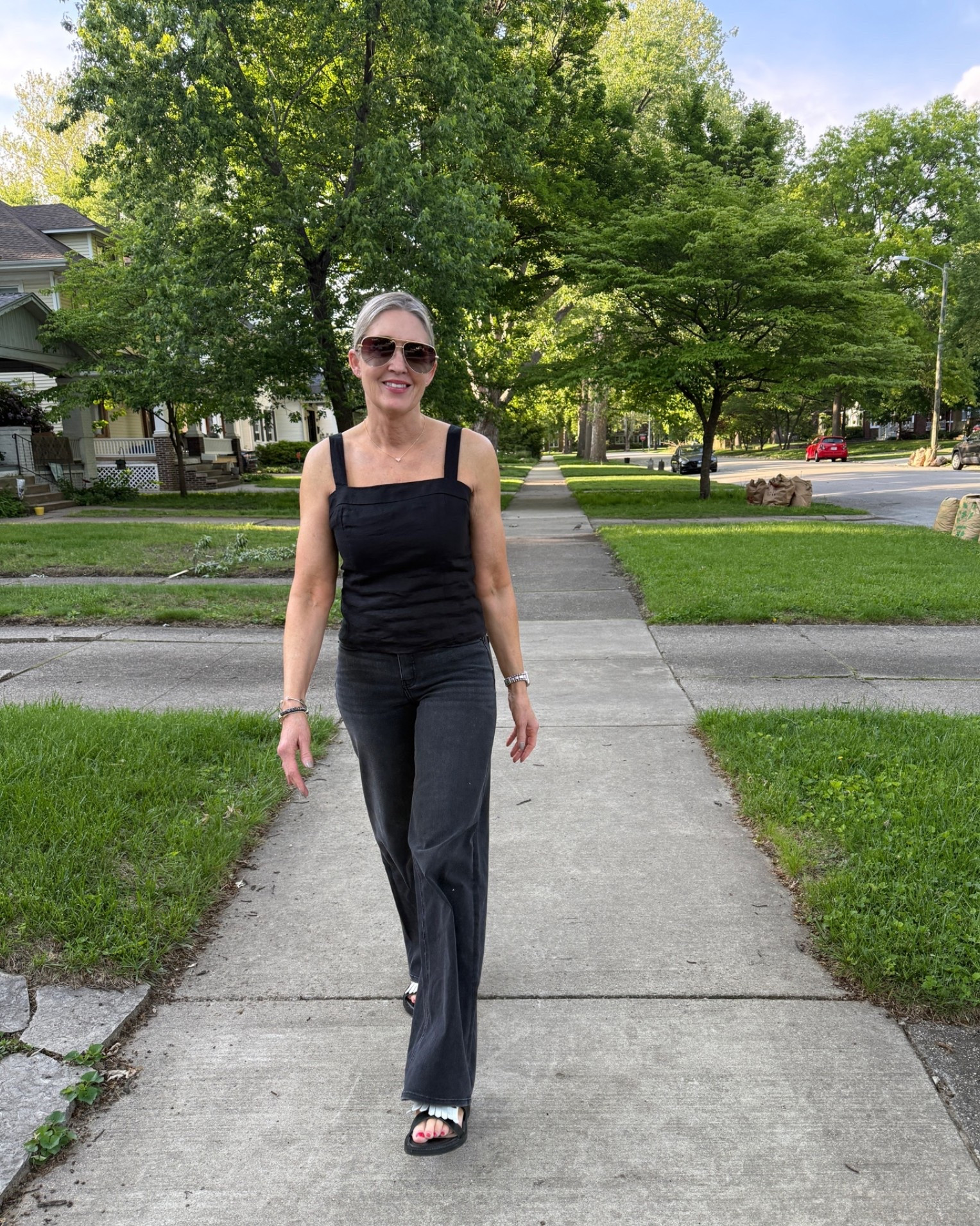 Summer concert outfit. @Quince cropped linen top size small and Bella wide leg jeans size 25 length 32. 

Summer outfit, date night outfit, all black outfit, linen top, spring outfits 2026, mom looks, fashion over 40, fashion over 50, affordable fashion, denim trends

#LTKootd #LTKgrwm #LTKOver40