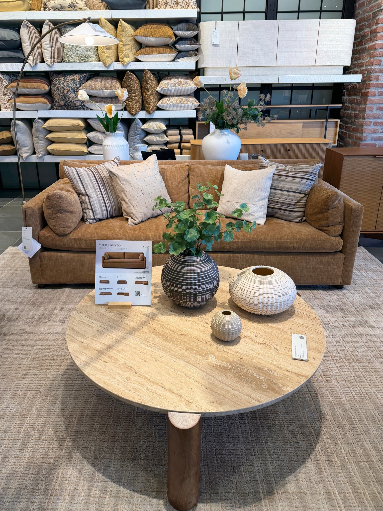 Warm living room inspo with a modern organic feel. 😍 The Marin Sofa from West Elm in the ochre Performance Chenille Crossweave adds such a rich, cozy tone to the space, while the travertine coffee table brings in that beautiful natural stone texture. ✨🤎🌿 I love the mix of warm earthy colors and layered materials here—it creates a living room that feels inviting, relaxed, and thoughtfully styled. Linked this whole setup and similar pieces to shop! 🙌🏻 #WestElm #LivingRoomInspo #ModernOrganic 

#LTKHome #LTKSaleAlert
