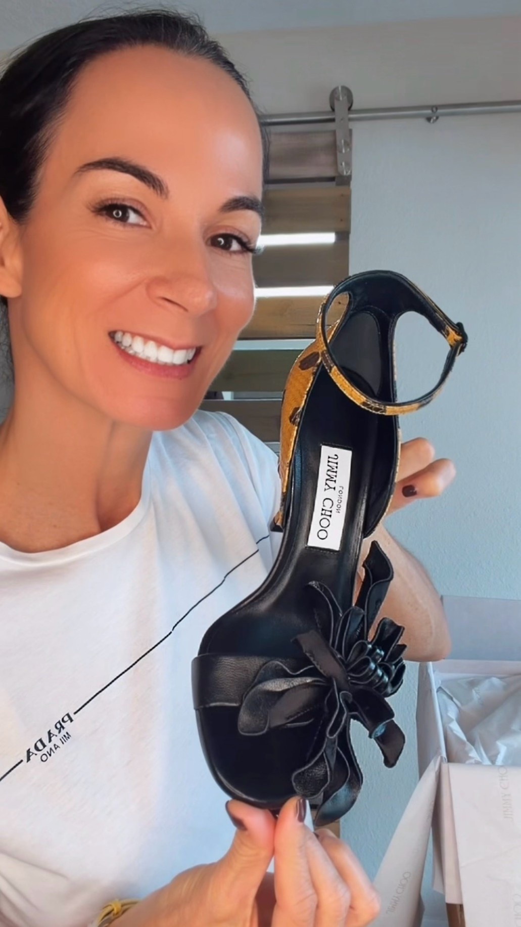 A little bougie mail day 🖤 Unboxing these statement Jimmy Choo leopard heels with black floral detailing and my new Celine jeans. You know I take my denim research very seriously… and apparently my shoe research, too. 🤭 Shop both below and in stories!