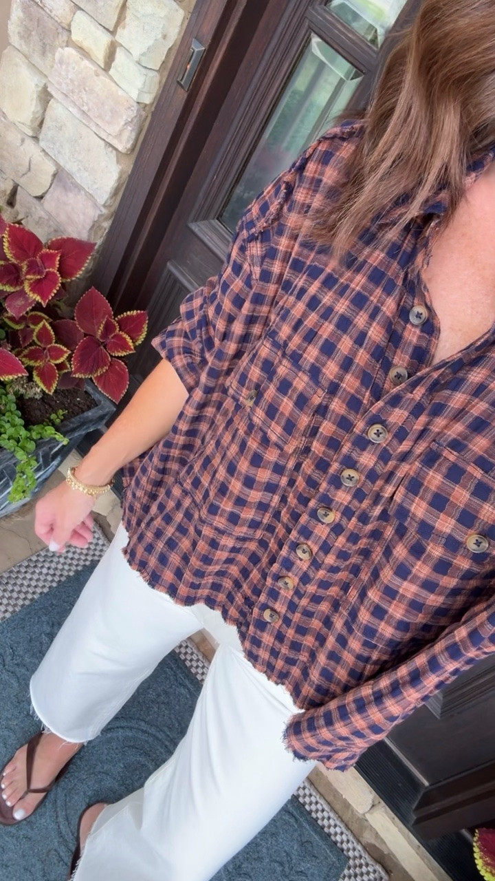 Fall plaid buttondown with a raw hem and high/low silhouette. 
Top S. Jeans down 1 size, 24.