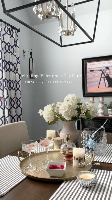 Celebrating Valentine’s Day’s early with Prosecco and pretty florals! Shop Prosecco glasses, white hydrangeas, trophy vase, glass ice bucket, candles, brass trays, votives, artwork, sconces on sale. Home decor accessories. Sales, free shipping. Amazon home, Target, Kirkland’s. 

#LTKsalealert #LTKhome #LTKVideo