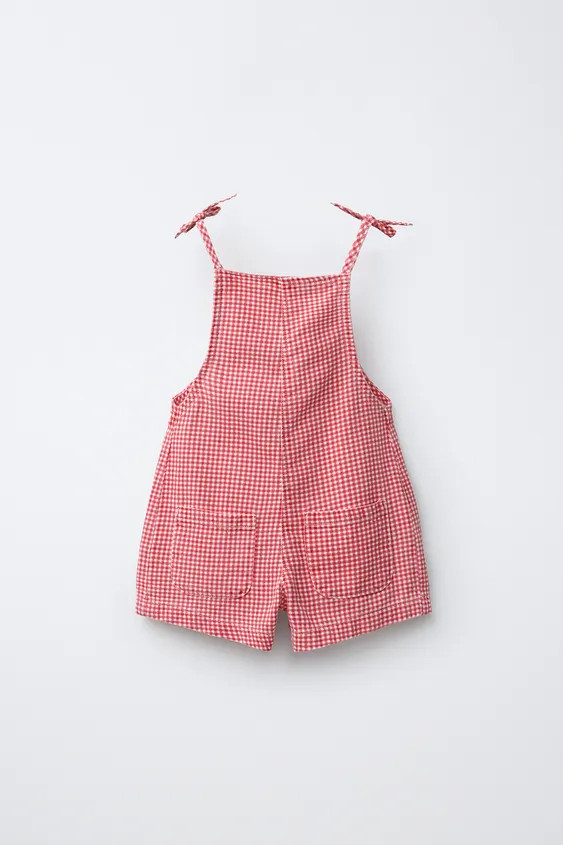 Short jumpsuit with straight neckline and tie-detail straps. Snap button closure at back. Patch p... | Zara US