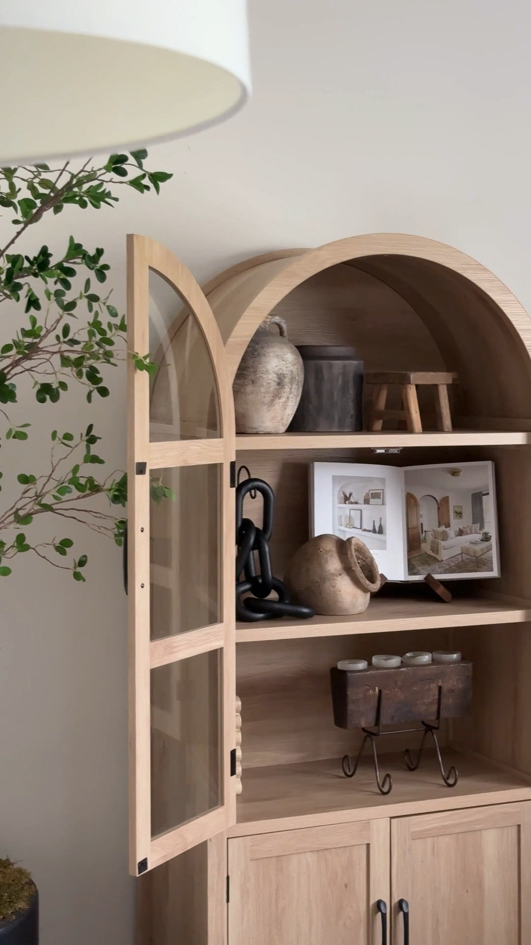 Arched cabinet styling! Some items are thrifted but I’ve linked everything else here! 
Earthy organic modern decor, bookcase styling, vintage modern, rustic home finds, cabinet style

#LTKSaleAlert #LTKFindsUnder50 #LTKHome