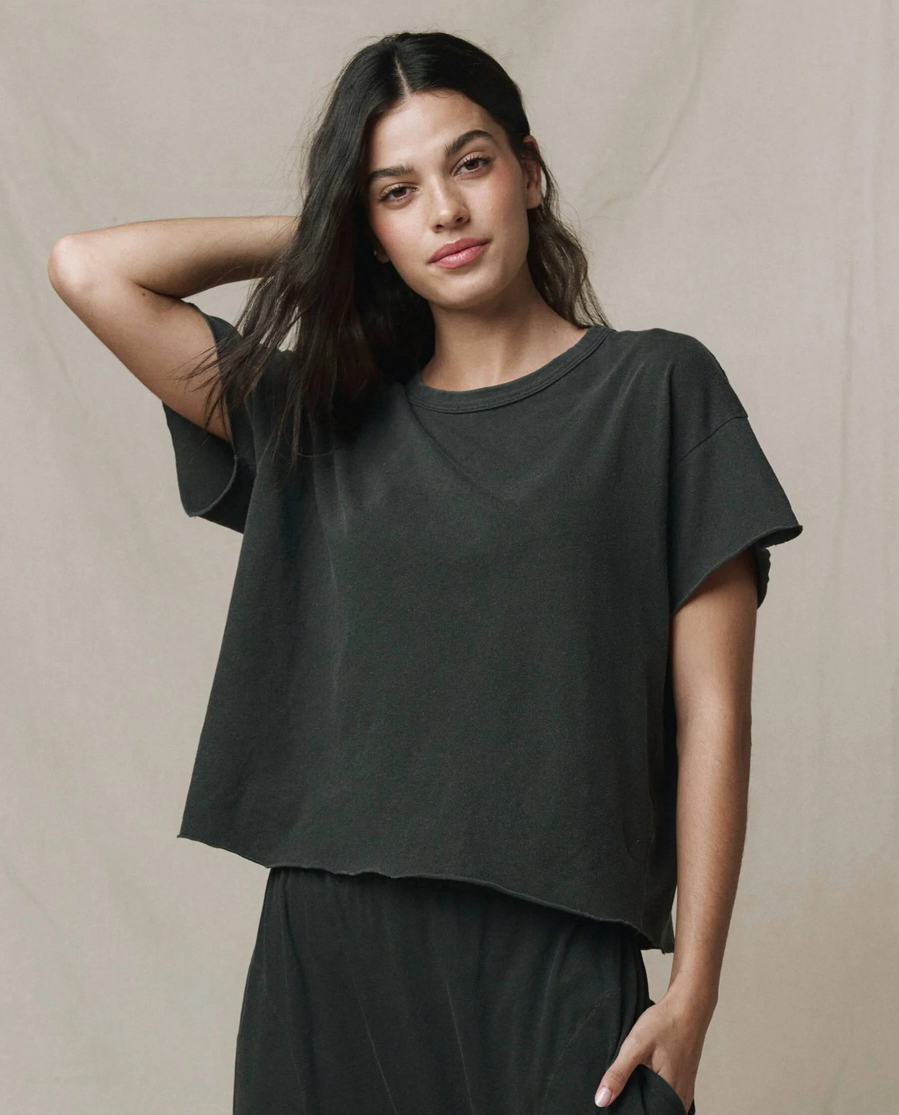 The Crop Tee. Solid -- Washed Black | THE GREAT.
