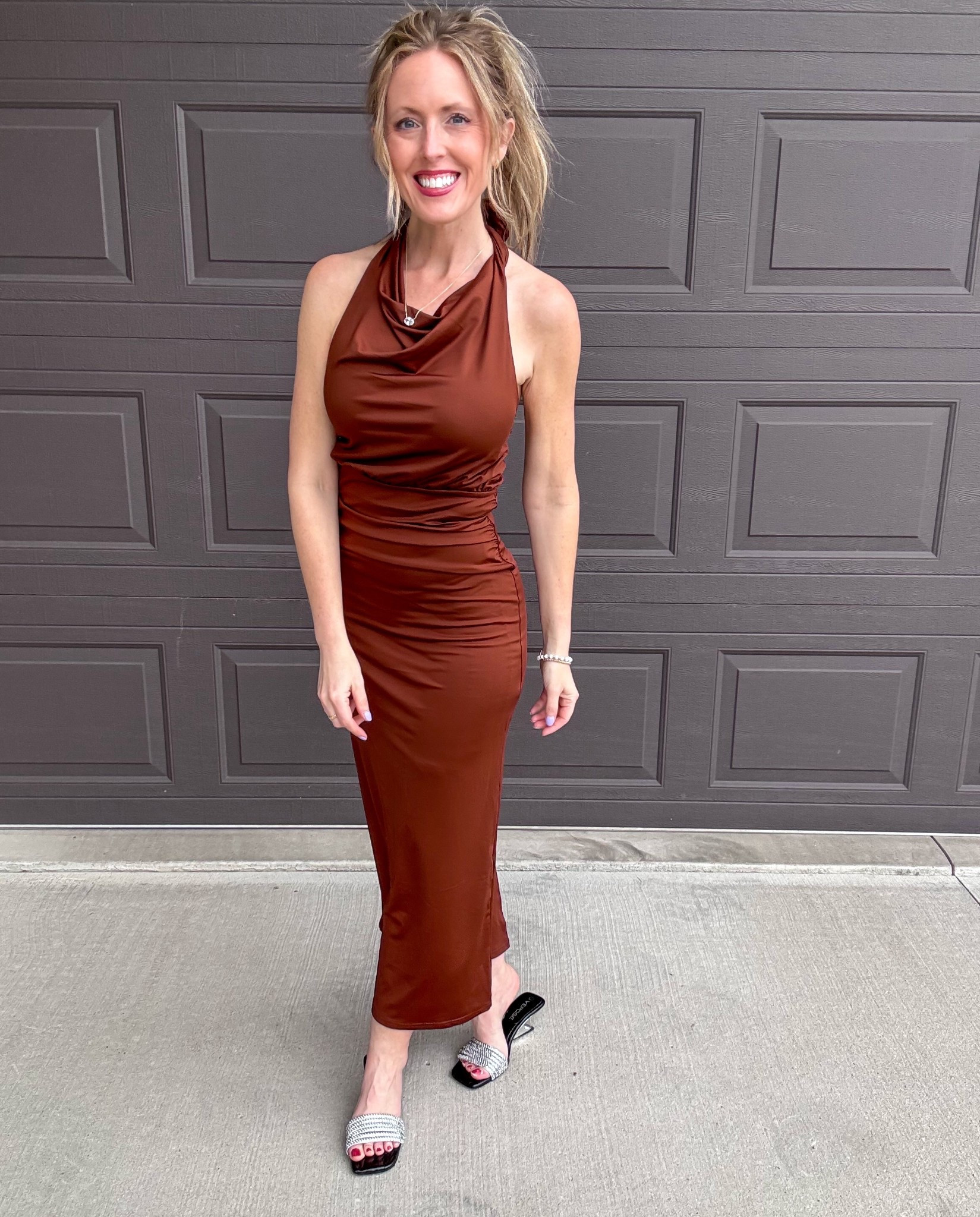 This brown halter dress is so pretty! 🤎 Loving it paired with these rhinestone sandals! Wearing a small in the dress and size 7 in the sandals.

As an Amazon Influencer I earn commission on qualifying purchases.

Brown dress, spring maxi dress, wedding guest dress, halter dress, embellished sandals, mom style, fancy style, event outfit inspo 

#LTKMidsize #LTKootd #LTKOver40