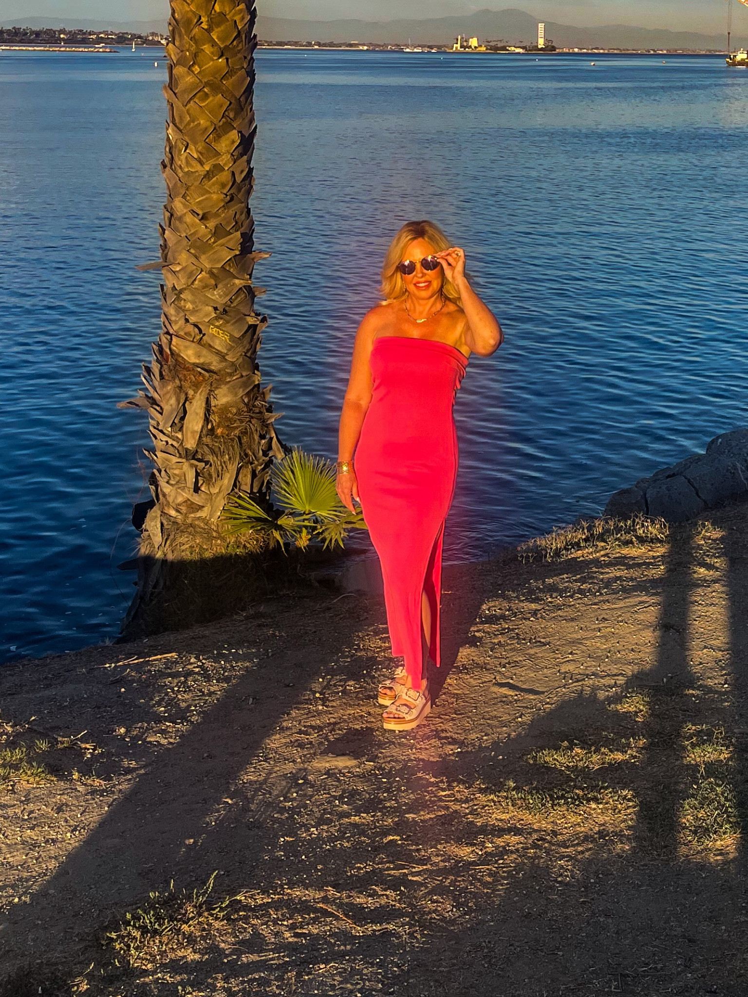 Another casual vacay look. This tube dress is so cute and comfy! Can dress it up with heels or wear cute sneakers with a denim jacket for a more casual look. 

#LTKunder50 #LTKtravel #LTKstyletip