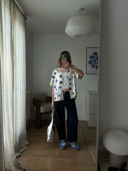 Casual outfit, printed shirt, Uniqlo jeans, tote bag, blue adidas gazelle trainers, Vehla sunglasses, transitional outfit, baggy jeans, spring outfit, white vest 

#LTKuk #LTKspring #LTKstyletip