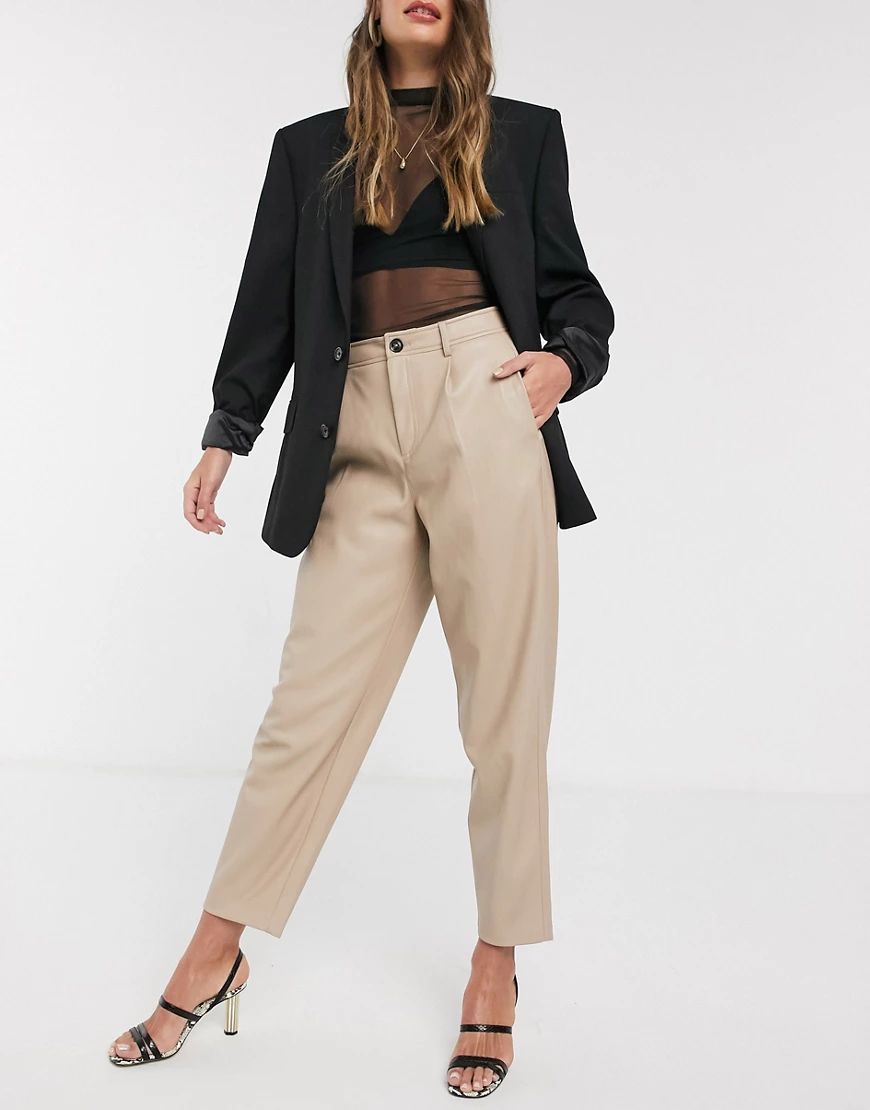 Mango faux leather slouchy pants in beige | ASOS (Global)