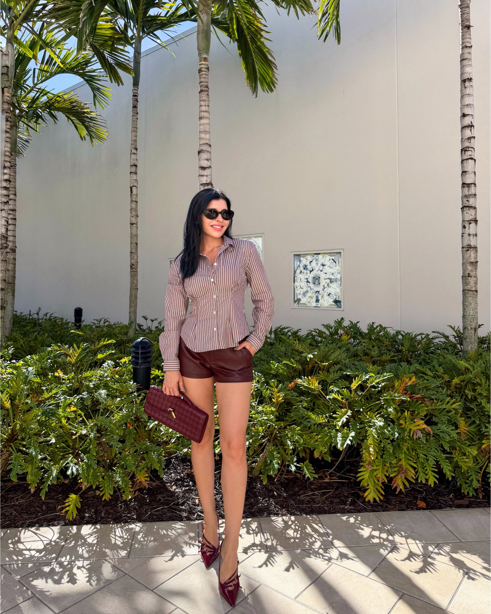 Stripe structured blouse and faux leather shorts 

#LTKootd #LTKWorkwear #LTKFindsUnder100