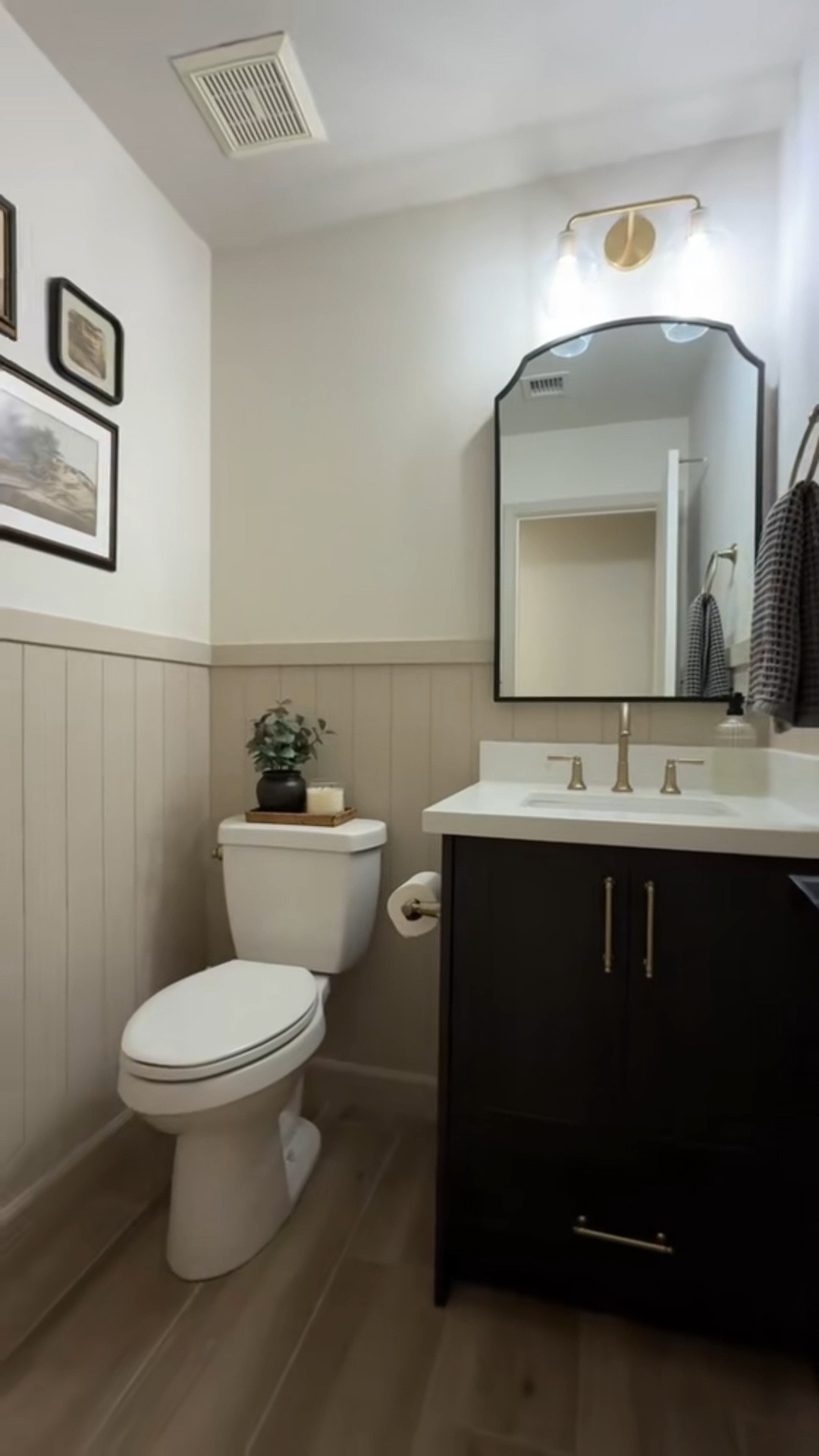 Powder room reveal! So happy with how this turned out!! Love the shiplap against the black cabinet. Fixtures are all champagne bronze by Delta. 
#bathroom #renovation #champagnebronze #bathroomvanity #homedecor #bathroomdecor #decorinspo 



#LTKHome #LTKSeasonal #LTKSpringSale