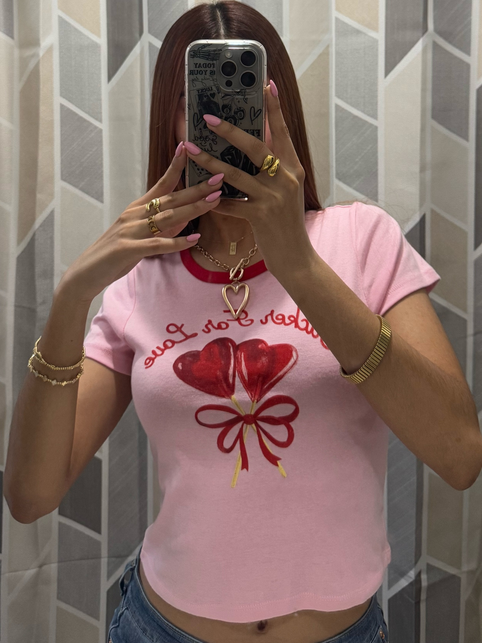 Pink tshirt, valentines tshirt, pink and red shirt, gold jewelry, gold rings, gold necklace, gold accessories, light denim jeans 

#LTKStyleTip #LTKFindsUnder100 #LTKSaleAlert