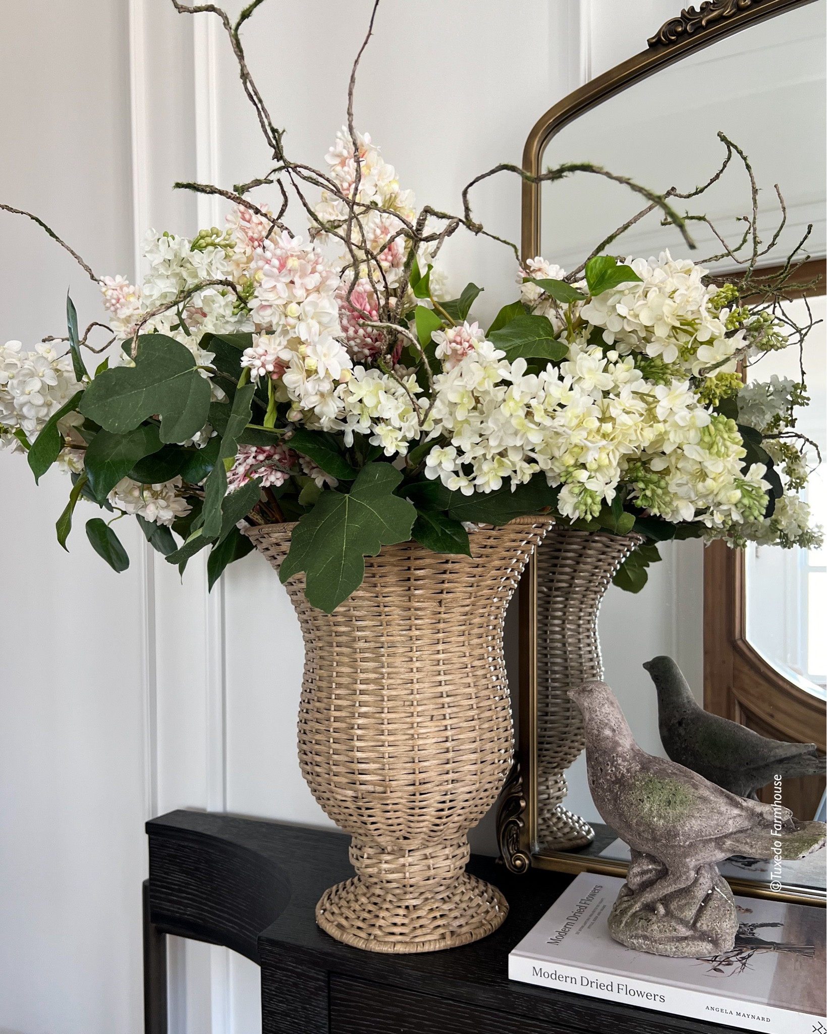I grabbed this large, rattan vase when I first saw it a couple weeks ago. It’s already on clearance! I filled mine with white and pink lilacs, 3 greenery stems and 3 wispy branch stems.

#LTKSaleAlert #LTKHome #LTKSeasonal