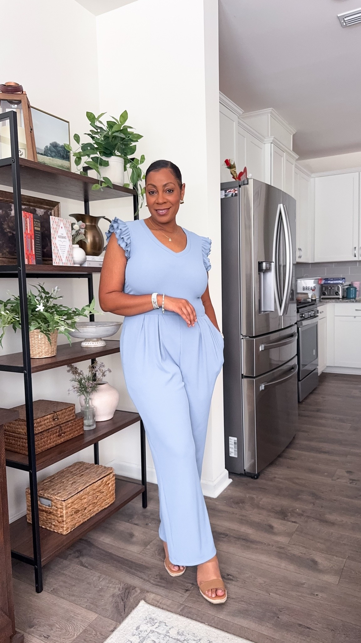 This powder blue jumpsuit is one of those outfits that looks like you spent time getting ready when you really didn’t. The ruffle sleeves add a feminine touch while the wide-leg fit keeps it comfortable and flattering. Wearing size large fits tts.

#LTKootd #LTKMidsize #LTKSeasonal