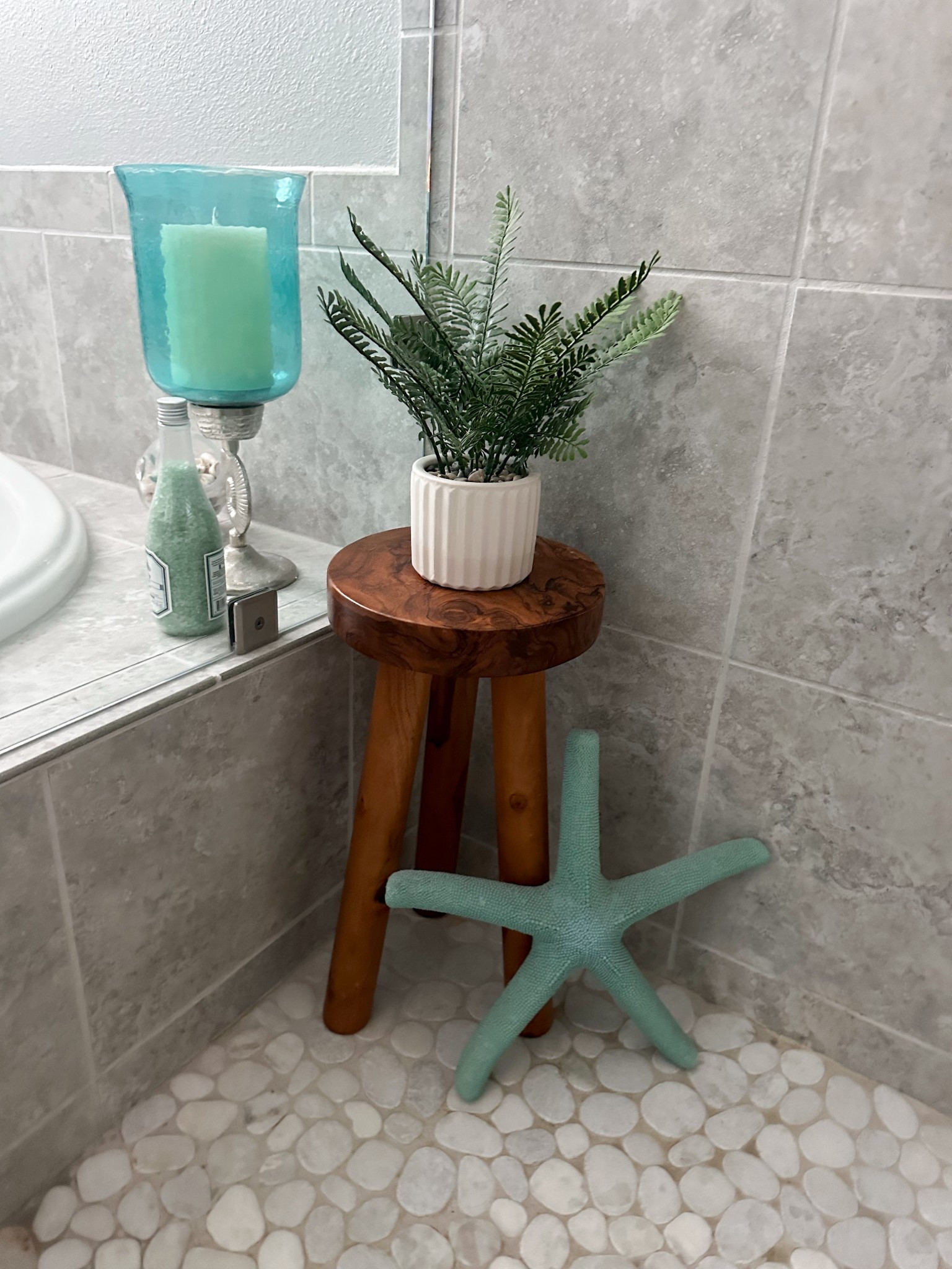 Coastal master bathroom shower, this teak wooden 3 leg stool has been a great addition the last few years. Glad I didn’t do the white legs that were trending then this one solid wood is just gorgeous. #woodstool #showerstool #teakshowerstool #olantstook #serenaandlilly #beachdexor #coastaldecor #coastalbathroom #aquablue 

#LTKStyleTip #LTKHome #LTKSeasonal
