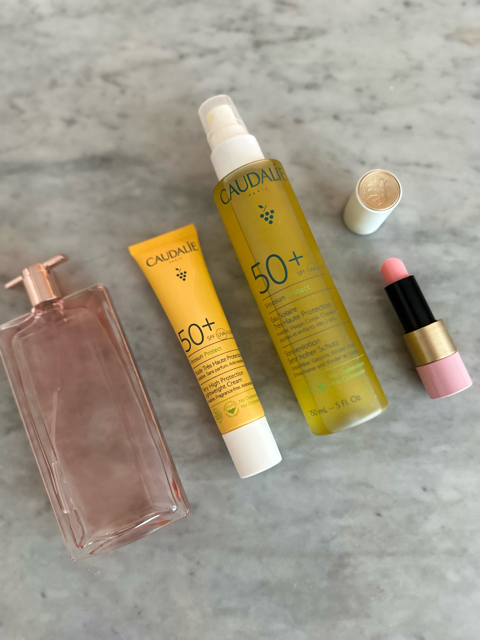 My summer beauty essentials 🩷☀️

Vinosun sun protection by Caudalie 
Perfume Idôle by Lancôme
Lip balm Rose Confetti by Hermès

#LTKBeauty #LTKSeasonal #LTKTravel