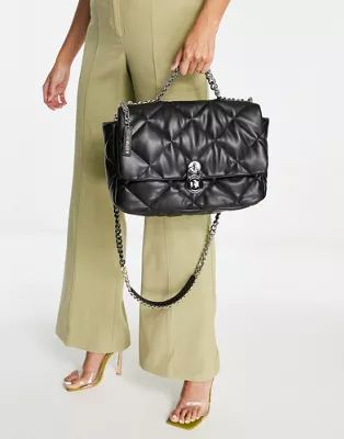 Steve Madden - Exclusivité - Btanna - Sac bandoulière matelassé à fermoir - Noir | ASOS (Global)