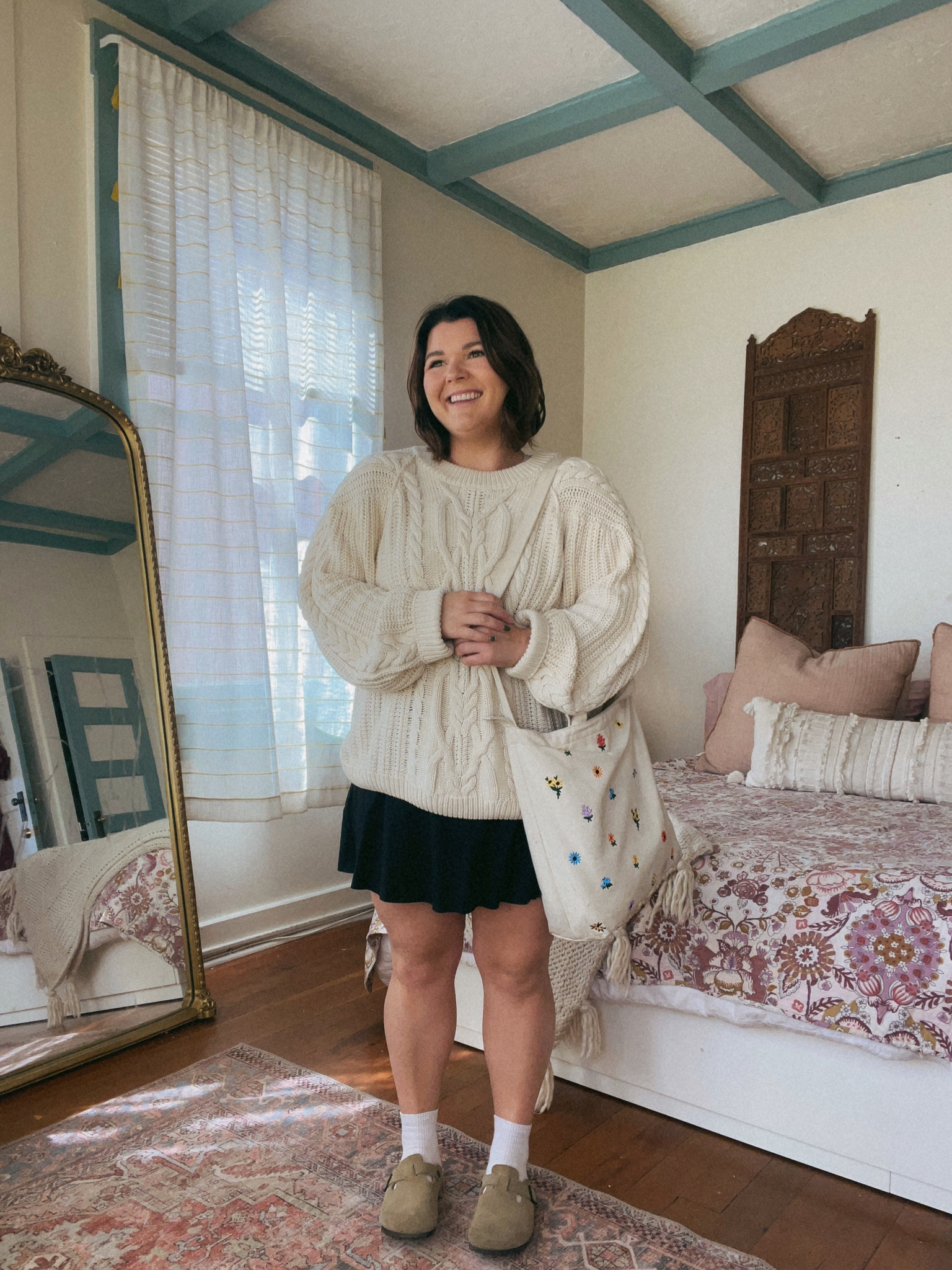 Midsize fall bump friendly outfit day 2! Wearing my new favorite free people sweater (my Rory Gilmore sweater) with my Athleta skort that was pretty roomy on my pre pregnancy but now fits great and is very comfy. Wearing both pieces in size XL. And of course what screams fall more than the Birkenstock bostons? And my cute baggu floral tote!

#LTKSeasonal #LTKmidsize #LTKbump