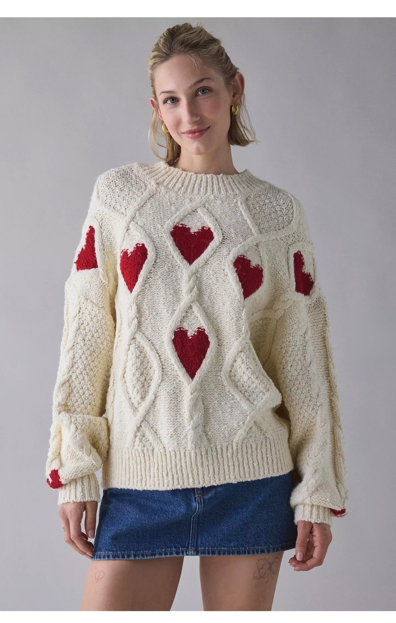 UO Alexa Heart Cable Knit Mockneck Sweater

Classic-meets-romantic UO cable knit sweater made special with heart stitched detailing throughout. Oversized chunky knit sweater featuring a high mockneck, slouchy drop-shoulder long sleeves and ribbed trims throughout for a timeless finish. Pairs perfectly with skirts, jeans and pants for endless cozy-cute outfit ideas! Exclusively at Urban Outfitters

#LTKSeasonal #LTKHoliday #LTKWorkwear