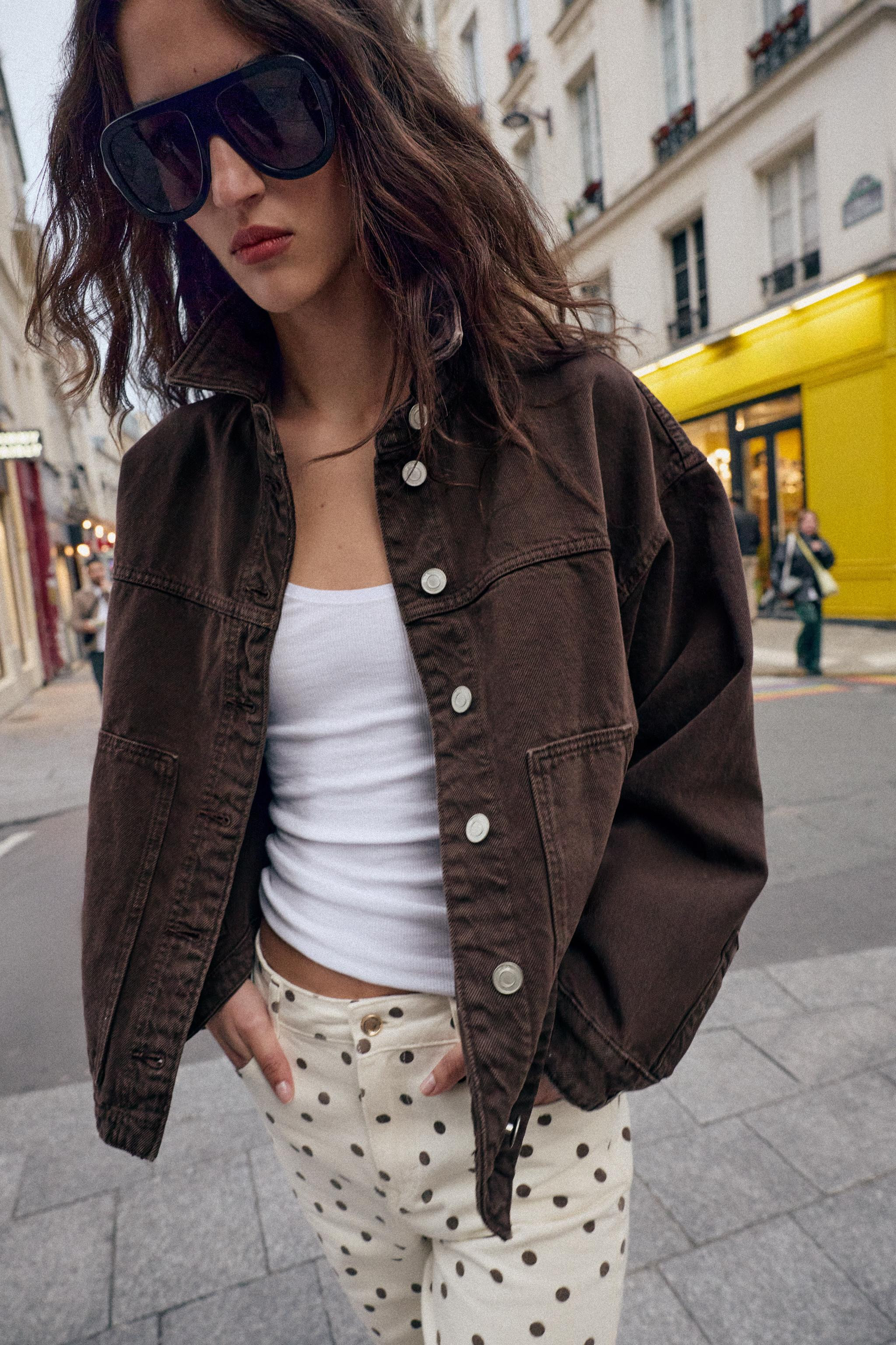 Model height: 183 cmCollared jacket with long sleeves. Featuring front patch pockets and metal bu... | Zara US
