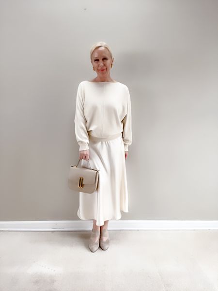 Ivory dolman sweater styled with ivory satin skirt for a holiday party outfit or holiday concert outfit  

#LTKHoliday #LTKfindsunder50 #LTKover40