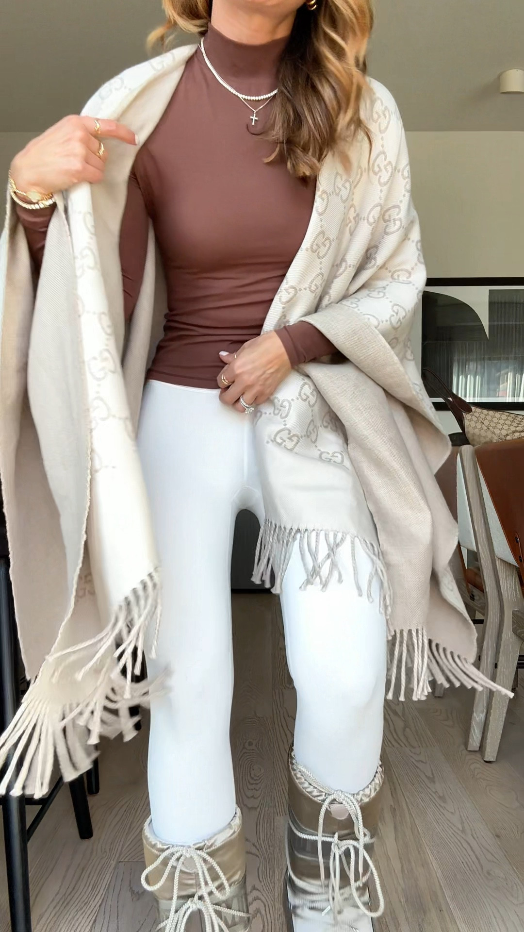 My ski trip outfit. Park City outfit. Winter outfit. Gucci cape. Pumiey brown seamless top in XS. Alo cream leggings in XXS. Dinner outfit. Moon boots. 

#LTKTravel #LTKootd #LTKSeasonal
