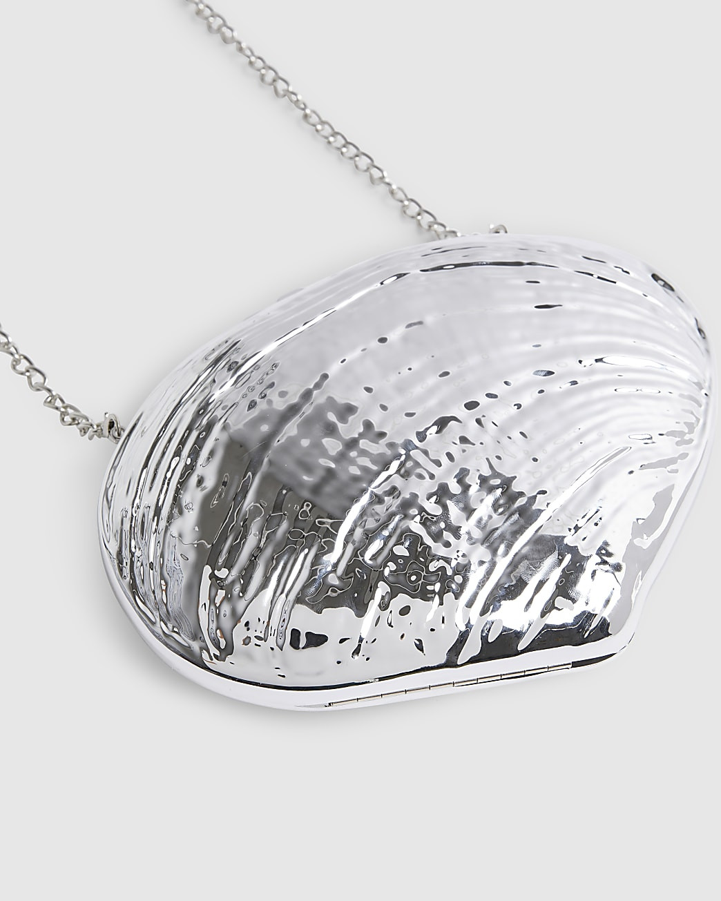Silver Shell Hard Clutch Bag | River Island UK & IE