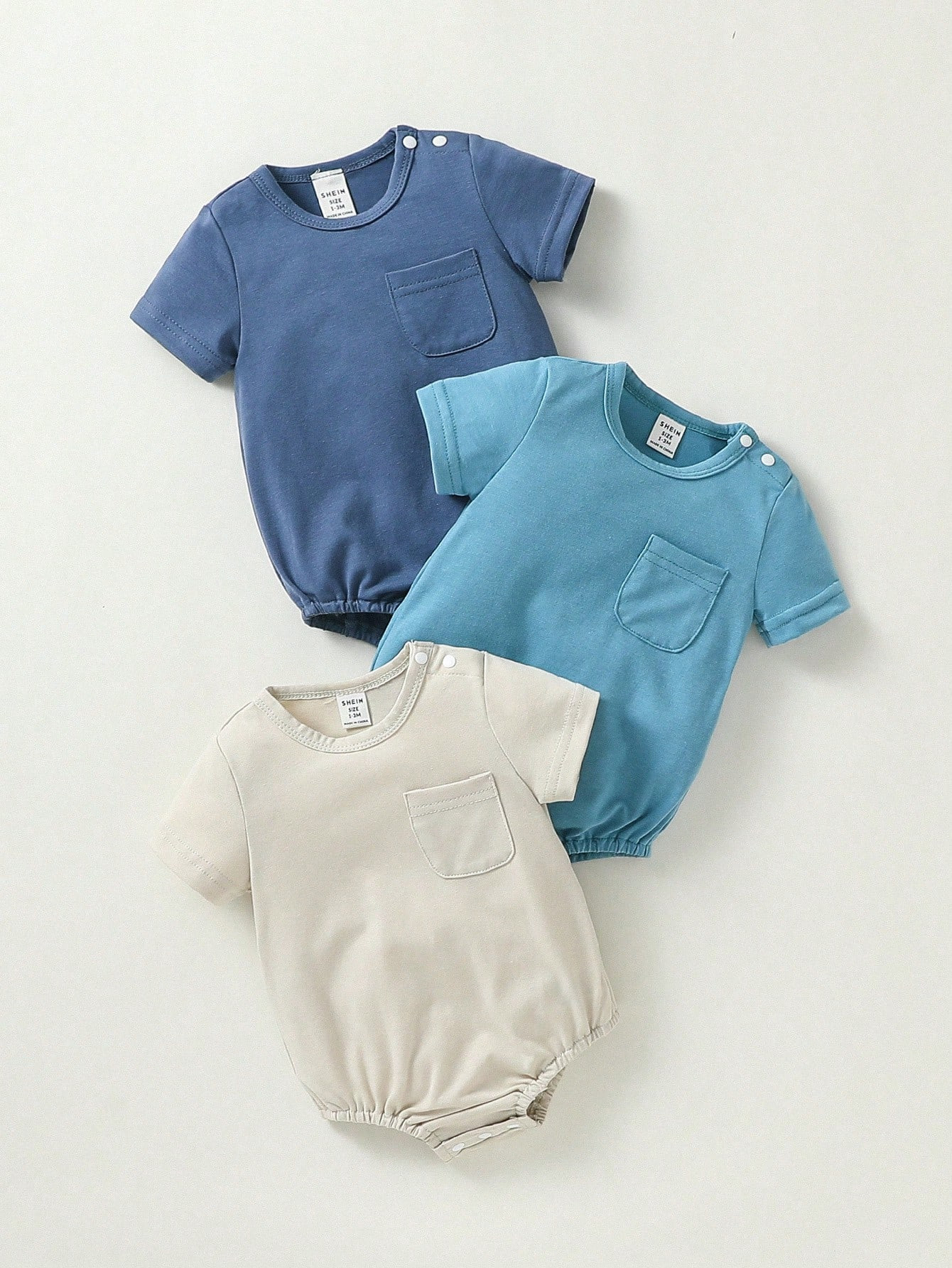 Baby Boy Button Detail Single Pocket Solid Color Bodysuit
       $12.10  $13.10 | SHEIN