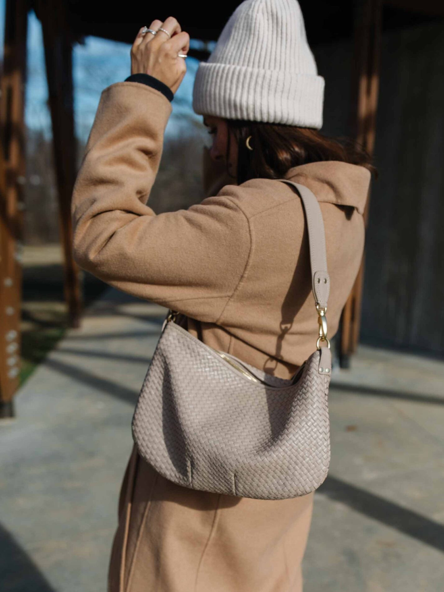 Something I couldn't leave behind in 2025...my beloved, handwoven leather shoulder bag from Quince. Even after a full year of use, the soft leather looks even better than when I got it and the hardware hasn’t tarnished or chipped!

This bag is an absolute must have - it fits all my essentials plus the crayons, snacks, and toys my kid inevitably hands me. It’s big enough to be functional but small enough to never overwhelm an outfit, the sweet spot for a true everyday shoulder bag.
