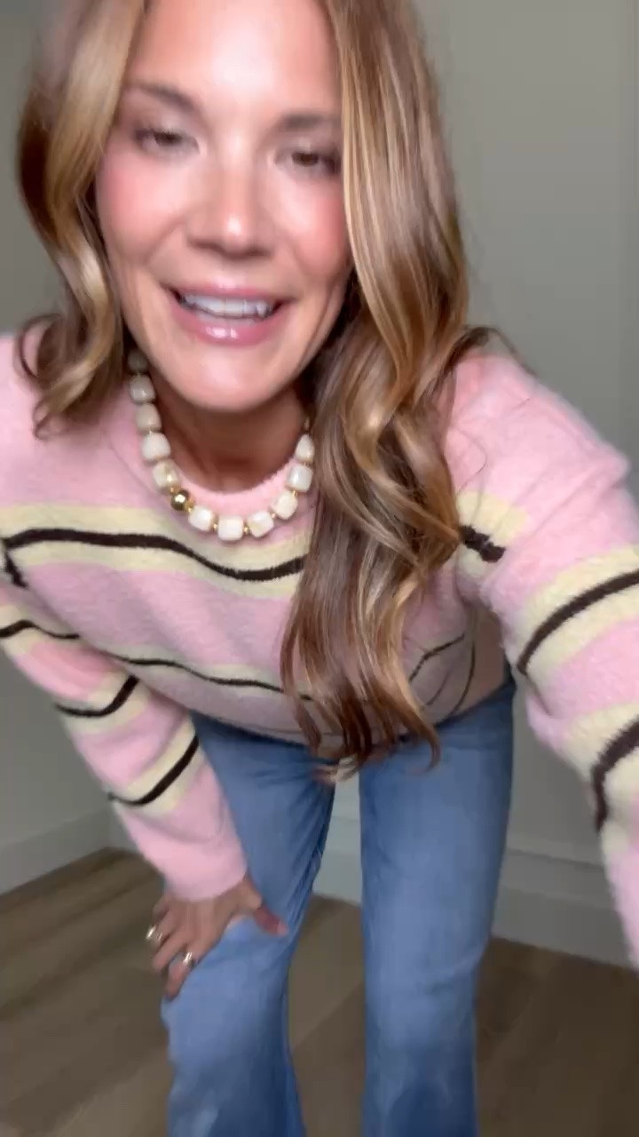 This striped sweater is making me very ready for sweater weather, even if the forecast isn’t quite there yet. The pink with the cream and dark stripes is such a fun color combination, and I love it with a relaxed pair of jeans and sneakers for an easy early fall outfit.

Striped sweater, Pink sweater, Fall sweater, Tall girl outfit, Sweater and jeans, Early fall outfit, Casual fall style, Straight leg jeans, Tall girl fashion, Fall outfit idea, Everyday style, StangandCo

#LTKSeasonal #LTKTall #LTKootd