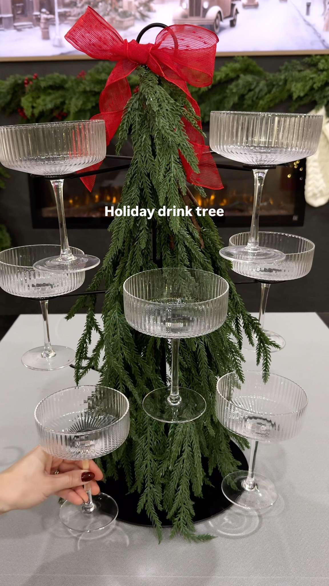 SAVE this idea for your holiday party🎄This drink tree has gotten so much use over the years! It can be styled so many different ways, but I think this is my favorite🤩 
•••

Christmas party, holiday party, Christmas drinks, holiday drinks, holiday hosting, hosting ideas, party ideas, drink stand, drink tree, tiered drink stand, holiday drink tree, party ideas, hosting ideas, hosting hack, cocktails, cocktail stand, cocktail tree, coupe glasses, stemware 

#LTKHome #LTKHoliday #LTKSeasonal
