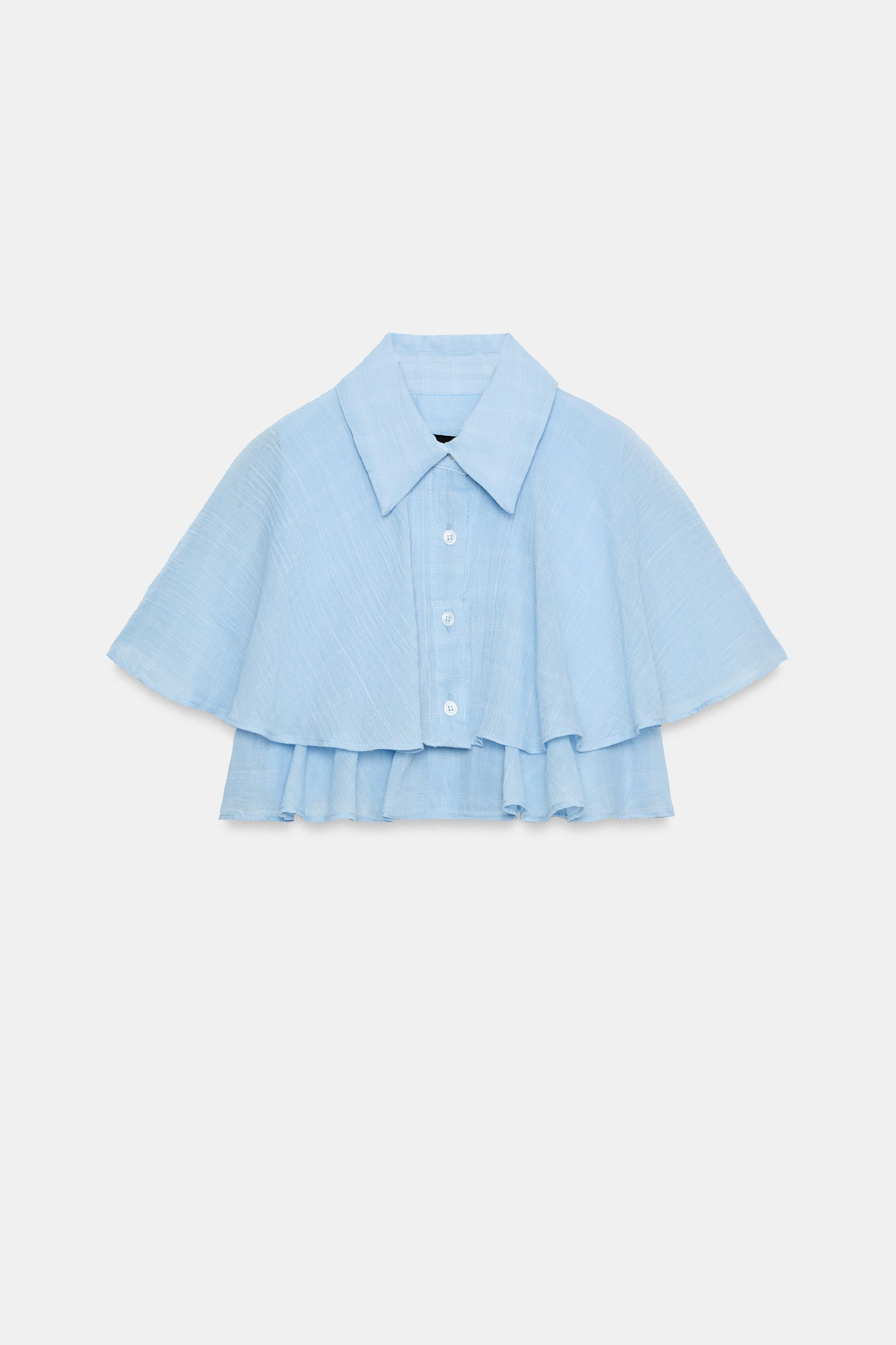 Shirt featuring a lapel collar and short cape sleeves. Detailed with ruffles and a button-up fron... | Zara UK