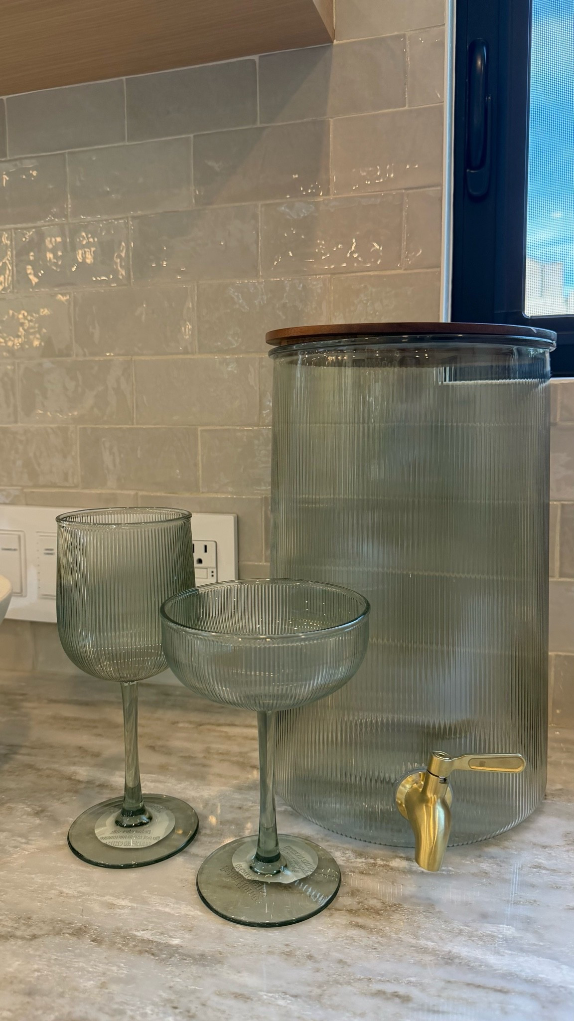 I love these ribbed glasses and water dispenser for my backyard and summer parties !!

#LTKcanada #LTKsummer #LTKhome