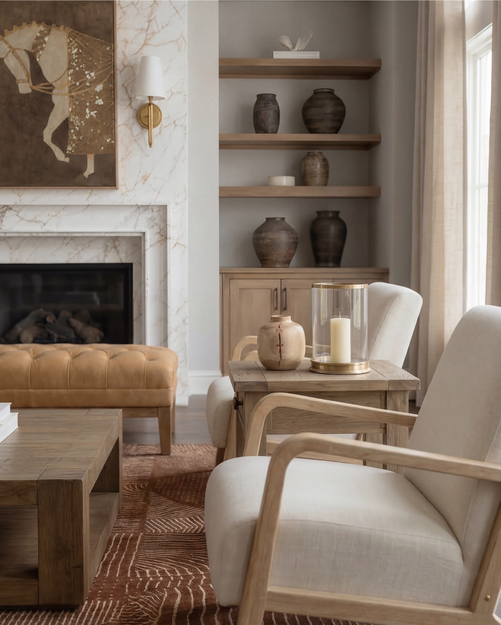 Shop the look:
* camel leather sofa
* beige upholstered accent chair 
* wood frame accent chair cream cushion
* tufted leather ottoman coffee table
* square wood coffee table
* rustic wood coffee table
* wood side table square
* round wood drink table
* brown patterned area rug
* vintage style distressed rug brown
* earthy tone geometric rug
* white globe pendant light
* brass wall sconce white globe
* modern brass sconce lighting
* neutral ceramic vase decor
* brown clay decorative vases
* glass hurricane candle holder
* pillar candle neutral
* stacked coffee table books neutral
* wood decorative bowl
* small pottery decor
* abstract neutral wall art
* modern brown beige artwork
* framed canvas neutral tones
* neutral throw pillow beige
* patterned accent pillow neutral
* textured throw blanket brown

#LTKsale #LTKhome