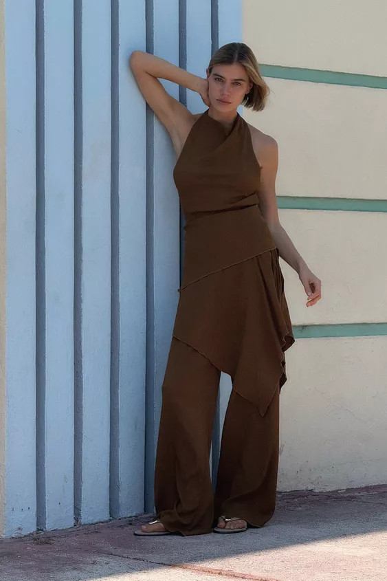 Mid-rise pants with interior elastic waistband. Adjustable wrap-style overlay detail with ties. W... | Zara US