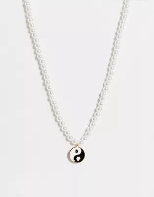 ASOS DESIGN necklace with pearl and flower ying yang charm | ASOS (Global)