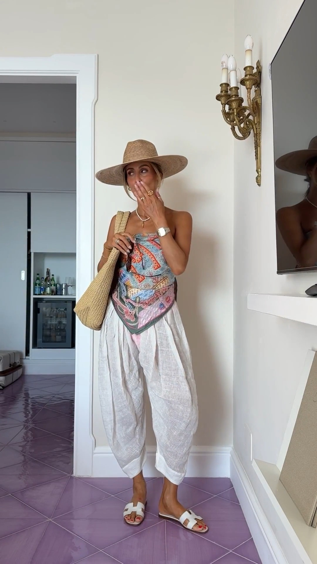 ICYMI: This is what I wore during a boat day spent in Capri (and what I plan on wearing to the pool for the rest of this summer!) 💗 If you've been a KSD follower for a while then you might know I have a deep love for Hunza G. This bubblegum pink bikini is a longstanding favorite and it makes for such a playful base to style around. To complement the bright hue, I tied a colorful silk scarf around as a top, then I kept things simple on the bottom with white pants. These exact balloon pants are out of stock, but I found a few similars from Zara that I'm linking here.   

#LTKStyleTip #LTKSwim #LTKFindsUnder100