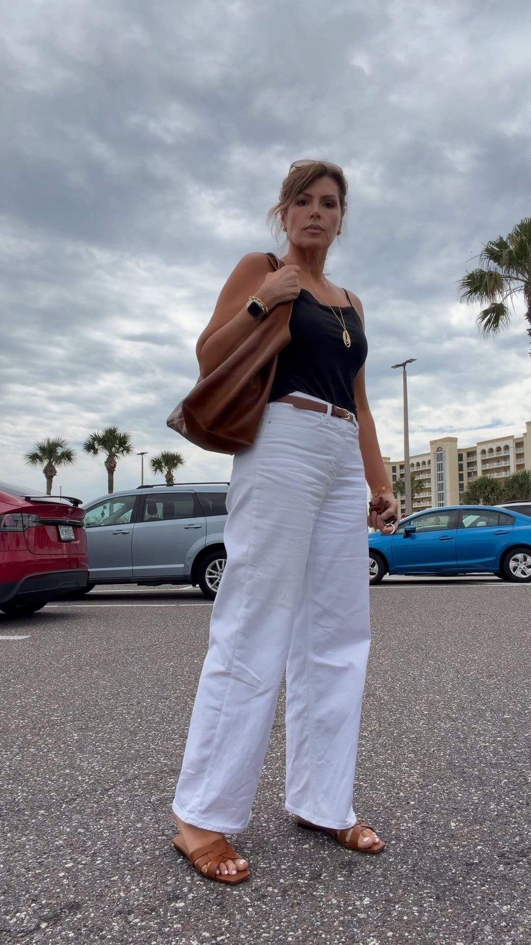 Effortless, elevated, and always on repeat 🤍
A sleek black cami + relaxed white denim + warm leather accessories = the easiest way to look polished without trying too hard.

Simple pieces… styled right always look more expensive.

⸻

#ltkstyle #ltkover50 #midsizestyle #effortlesschic #oldmoneyaesthetic #neutralstyle #summeroutfit #elevatedstyle #capsulewardrobe #everydaystyle

#LTKOver40 #LTKTall #LTKMothersDay