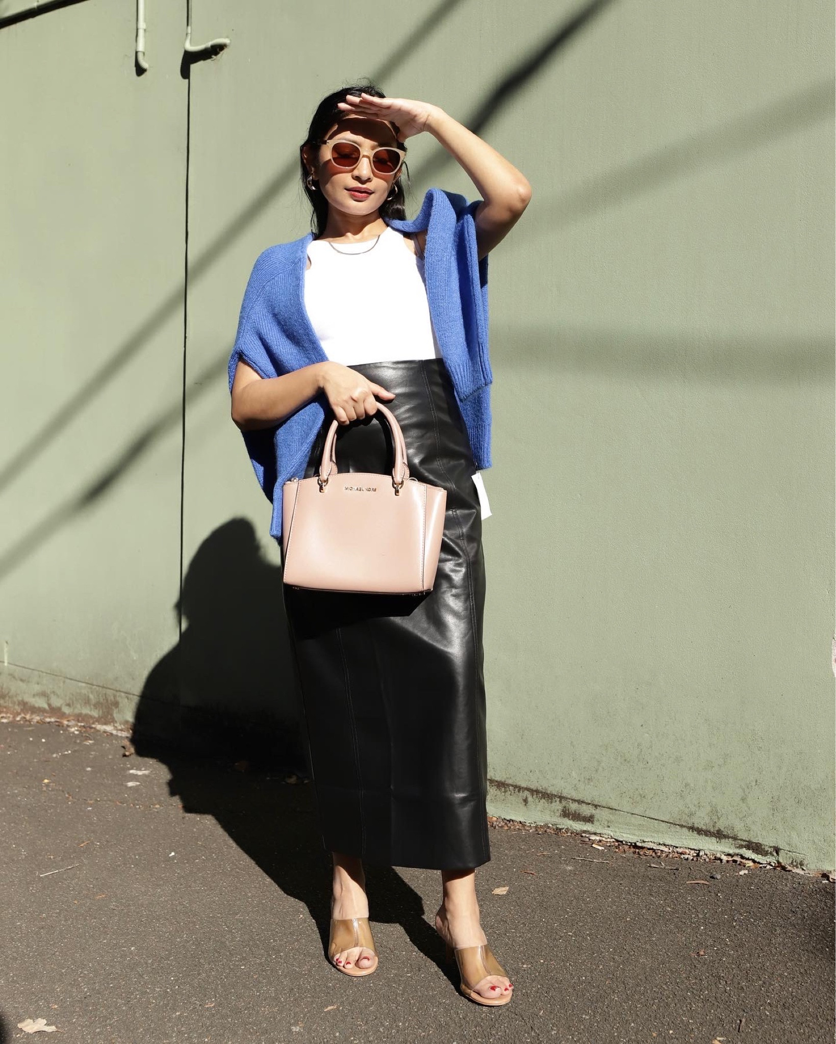 A classic a-line faux leather skirt and a white tank 💙 - Perfect Transseasonal Piece, added a pop of colour with the jumper

#LTKSeasonal #LTKaustralia #LTKFind