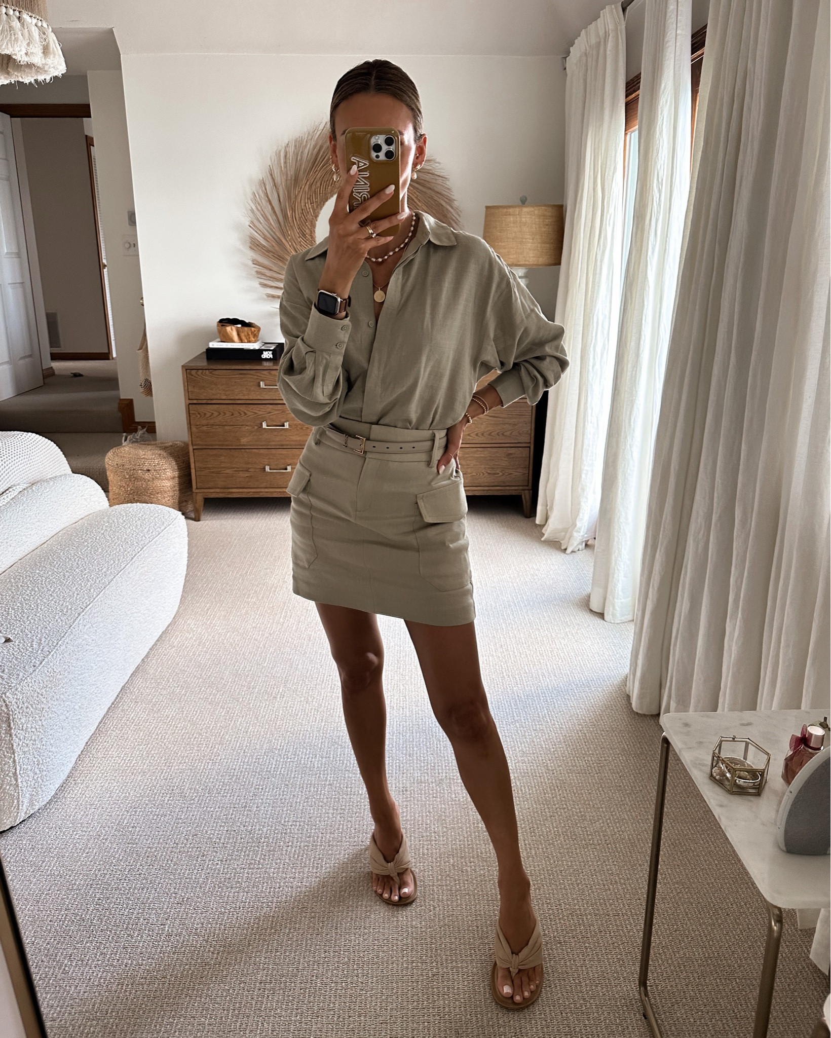 Loving this little linen shirt and cargo skirt set! They both fit tts, slightly oversized silhouette. I love them together or separate. Anniversary casual outfit - on sale today! 

#LTKstyletip #LTKsalealert #LTKunder100